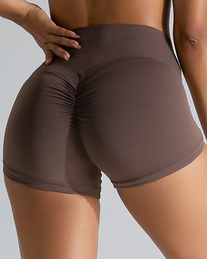 Shorts deportivos de yoga sin costuras que realzan las caderas