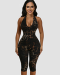 Mono ajustado con estampado de leopardo, escote halter sin espalda y levantacola