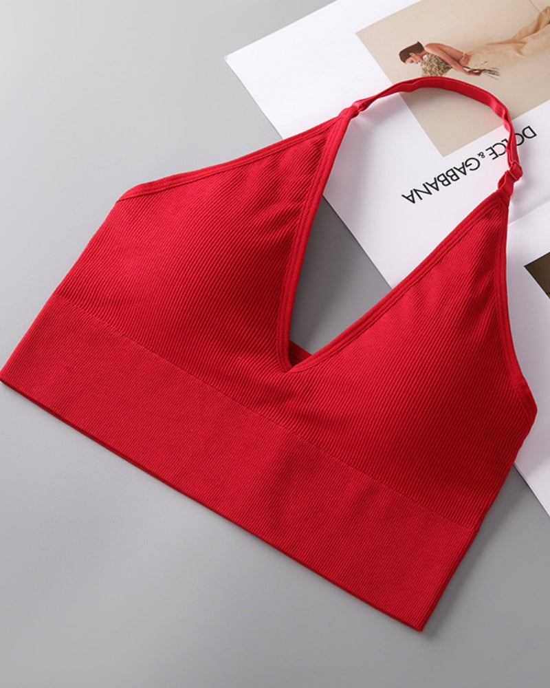 Soutien inalámbrico triangular con escote profundo en V, cuello halter y espalda descubierta