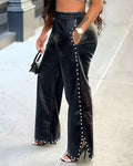 Pantalones de cuero sueltos y anchos con cuentas