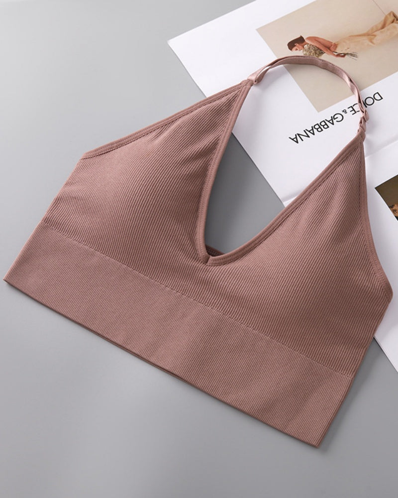 Soutien inalámbrico triangular con escote profundo en V, cuello halter y espalda descubierta