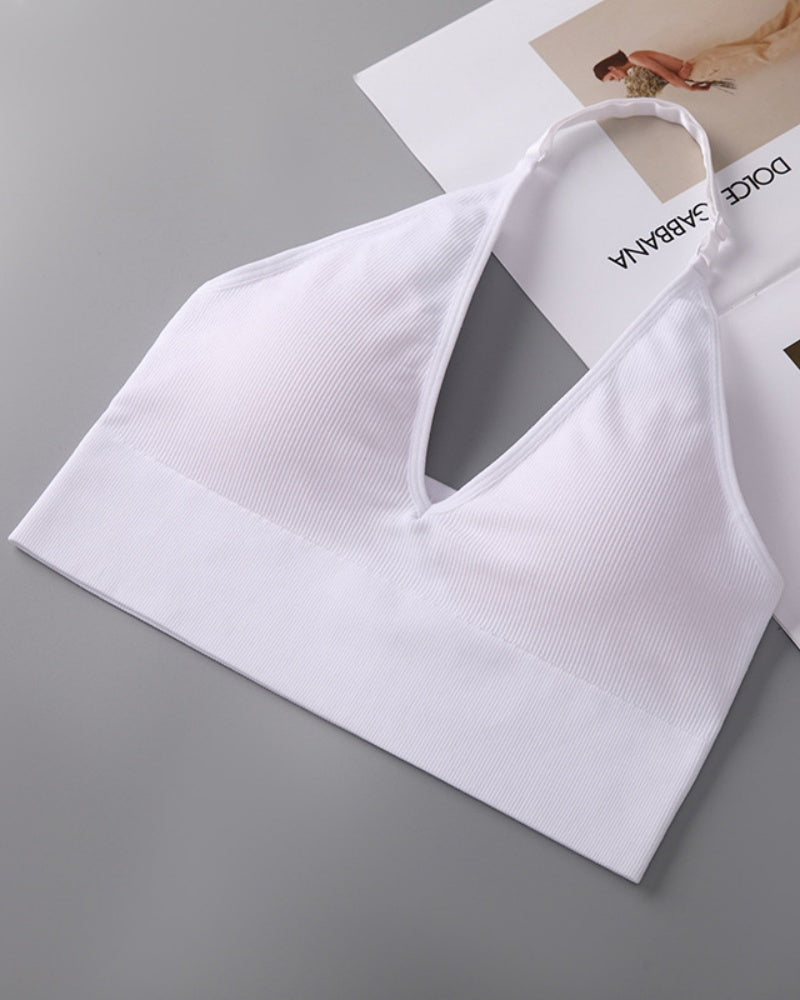Soutien inalámbrico triangular con escote profundo en V, cuello halter y espalda descubierta
